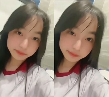 Thu Phuong mostra a borboleta no banheiro